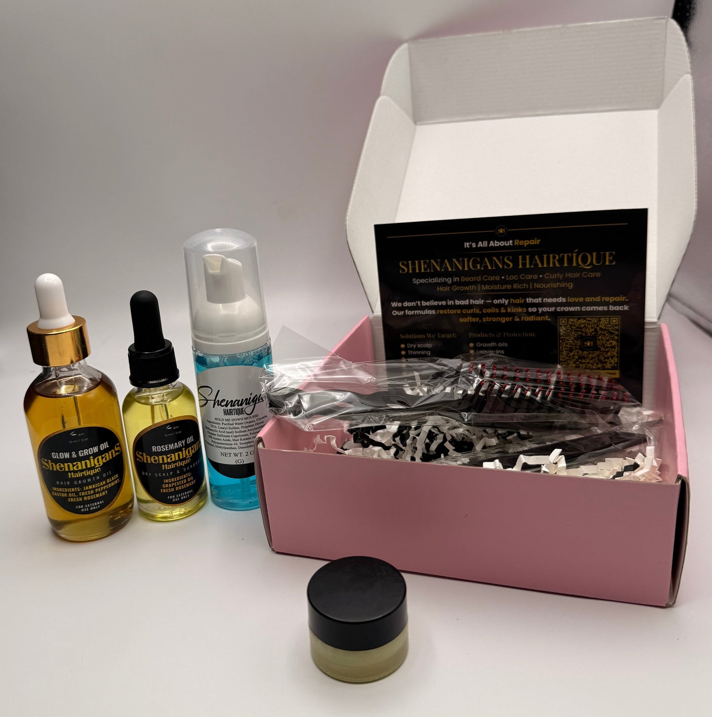 Set of Hair care product bundle including 2oz glow and grow oil, 1 oz rosemary oil, edge brush/detangling brush, hair mousse