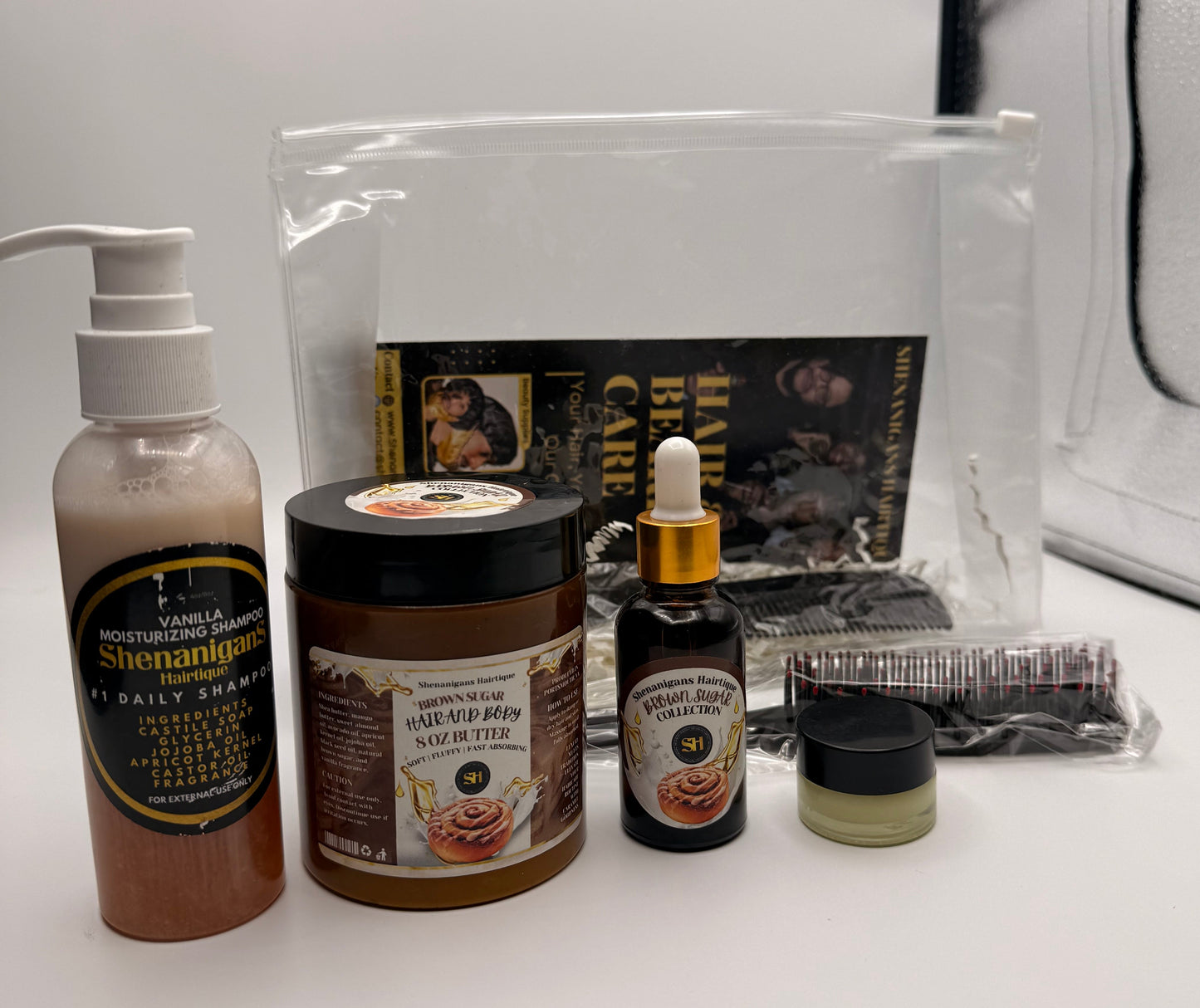 Set of Hair care product bundle including Brown Sugar Hair oil, Brown Sugar Butter, Moisturizing shampoo, and edge brush/detangling brush