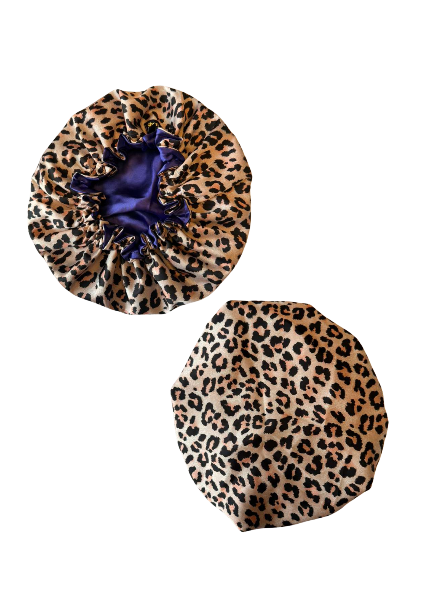 Front and back small leopard print custom bonnet lined with dark blue satin inside on a white background