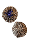 Front and back small leopard print custom bonnet lined with dark blue satin inside on a white background