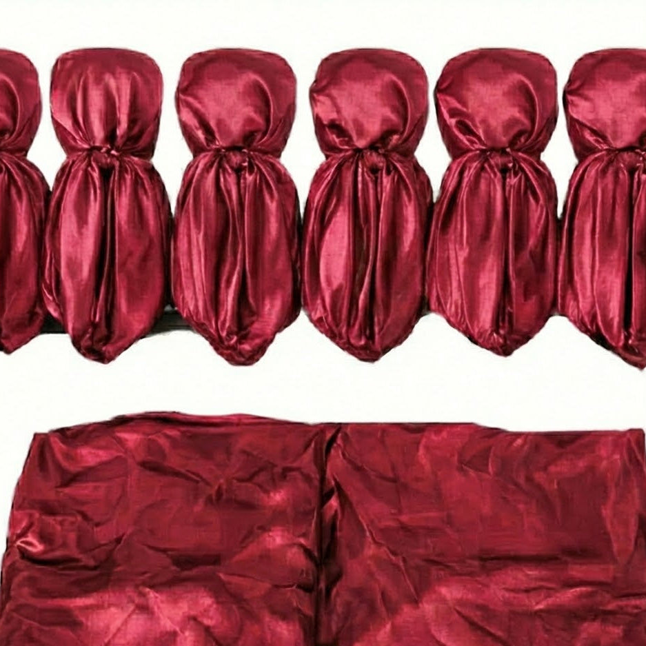 Red satin hair scarf and matching fabric on a white background